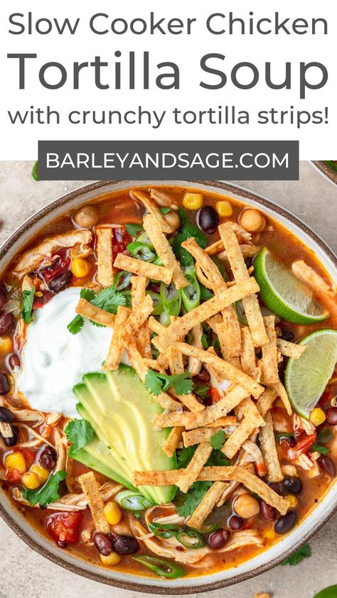 This simple slow cooker chicken tortilla soup is the ultimate easy weeknight meal! It's full of shredded chicken, beans, and corn; then topped with homemade tortilla strips, sliced avocado, and green onions. It's cozy, comforting, and super easy to make! Lean And Green Chicken Tortilla Soup, Clean Food Crush Chicken Tortilla Soup, Simple Slow Cooker Chicken, Slow Cooker Chicken Tortilla Soup Recipe, Homemade Tortilla Strips, Crockpot Chicken Tortilla Soup, Chicken Tortilla Soup Crock Pot, Amazing Slow Cooker Recipes, Chicken Beans