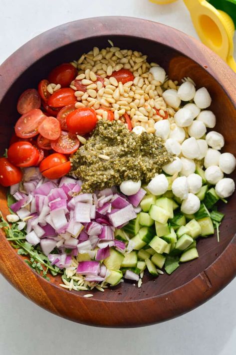 Orzo pesto salad with cherry tomatoes, bocconcini, cucumber, red onion, pine nuts and arugula. Chicken Salad Without Mayo, Orzo Pesto, Bocconcini Salad, Chicken Pesto Pasta Salad, Pesto Orzo, Pesto Salad, Green Pesto, Pesto Pasta Salad, Protein Pasta