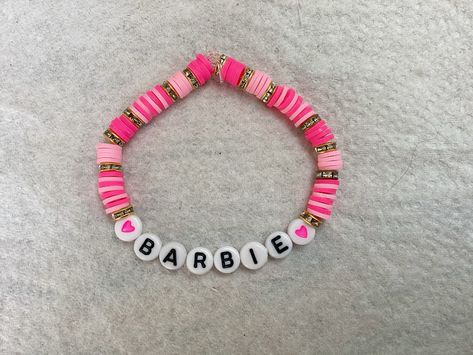 #barbie #pink #claybeads #fyp #bracelets Barbie Clay Bead Bracelet, Barbie Bracelet Ideas, Barbie Bracelet, Clay Beads Bracelet, Clay Bead Bracelet Ideas, Bead Bracelet Ideas, Clay Bead Bracelet, Jewelry For Girls, Bracelet Inspo