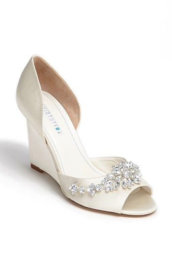 A glamorous yet comfortable bridal shoe option - these David Tutera wedge, offered in Ivory, Steel or Black satin. (Plus, there's a hidden "something blue" on the sole!) Wedding Shoes Heels White, White Wedding Shoes Flats, Wedding Shoes White, Winter Wedges, Wedding Wedges, Wedding Shoes Sandals, Wedge Wedding Shoes, Fun Wedding Shoes, David Tutera