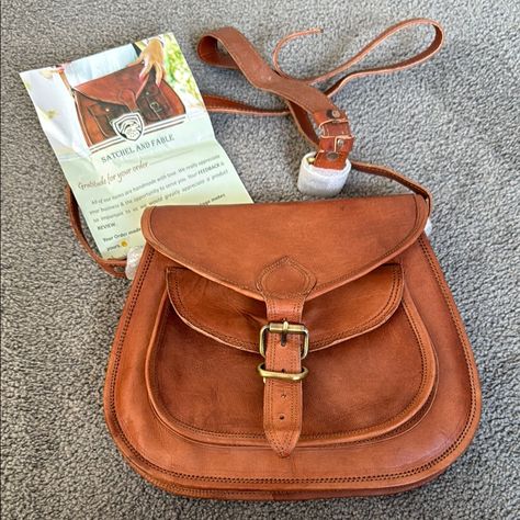 Brown Leather Women's Satchel And Fable Crossbody Bag. 11” X 10” X 2”. Green Canvas Lining. Zippers & Compartments Throughout!! Discover Elegance With The Brown Leather Bag. Perfect For Any Occasion, This Stylish Accessory Combines Functionality With Timeless Design. K 2-15-25 Hrbr Brown Leather Bag, Stylish Accessories, Leather Women, Leather Bag, Timeless Design, Brown Leather, Satchel, Crossbody Bag, Bag Lady