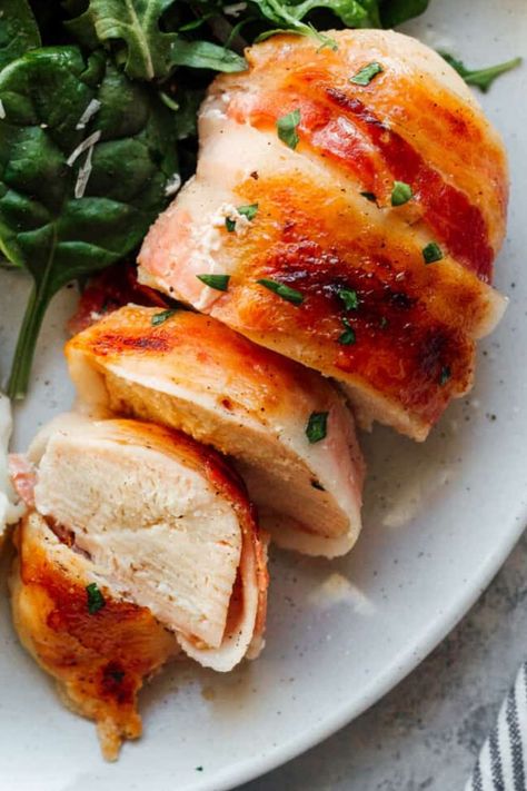 They’re the perfect blend of salty and sweet. Quick and easy to prep, this oven baked bacon wrapped chicken breast is one delicious and easy weeknight meal. When you want to get a delicious dinner on the table, but don’t want to spend hours in the kitchen, this recipe never dissapoints! Seasoned chicken breasts are wrapped in bacon and then drizzled with maple syrup. Bacon Wrapped Chicken Breast Oven, Thinly Sliced Chicken Breast Recipes, Baked Chicken Breast For Shredding, Scored Chicken Breast Recipes, Baked Split Chicken Breast, Baked Bacon Wrapped Chicken, Bacon Wrapped Chicken Recipes, Cheesy Chicken Recipes, Asparagus Stuffed Chicken Breast