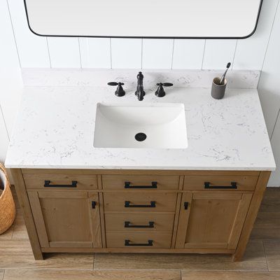 This 48" freestanding single vanity has a classic, clean-lined look for your bathroom. It features a solid and engineered wood base. Plus, this vanity comes with a rectangular, ceramic undermount sink (faucet sold separately). Four functional drawers, with two paneled-door cabinets, give you plenty of space for towels, toiletries, and cleaning supplies. Best of all, this bathroom vanity arrives fully assembled with a cutout in the back for convenient access to plumbing. Base Finish: Textured Nat Ceramic Sinks, Double Bathroom, Double Bathroom Vanity, Wood Vanity, Engineered Stone, Bathroom Vanity Set, Stone Countertops, Double Sink, Stone Top