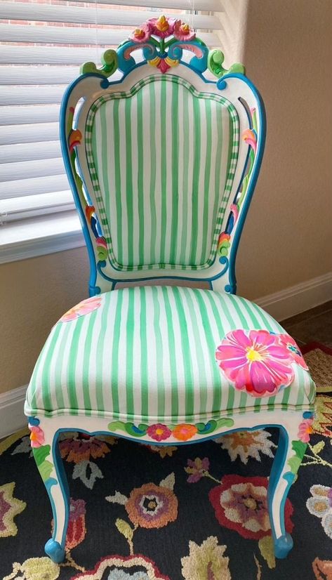 Take time to smell the flowers - or envelop yourself in them on this bright and happy side chair! Hand-painted and upholstered, this antique chair is painted french blue and white. Spring green and white painterly striped fabric adorns the front with a few fun floral appliqués on the seat. The back is a surprise bright floral fabric. Fabulous flower nailheads accent the back of each leg for an unexpected touch!  Message me with any questions or to discuss a custom order. Thanks for taking a look Upcycled Upholstered Chairs, Upholstery Chair, Painted Chairs Ideas, Upcycle Furniture, Chair Whimsy, Funky Reupholstered Chair, Whimsical Chairs Fabrics, Wicker Chair Makeover, Pink Floral Chair