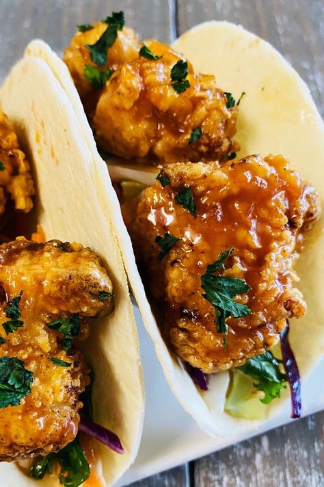 tacos with crispy orange chicken bites Recipe For Fried Chicken, Christmas Main Course Recipes, Fried Chicken Bites, Crispy Orange Chicken, Tacos With Slaw, Fried Chicken Taco, Slow Cooker Chicken Tacos, Buttermilk Chicken, Tacos And Burritos