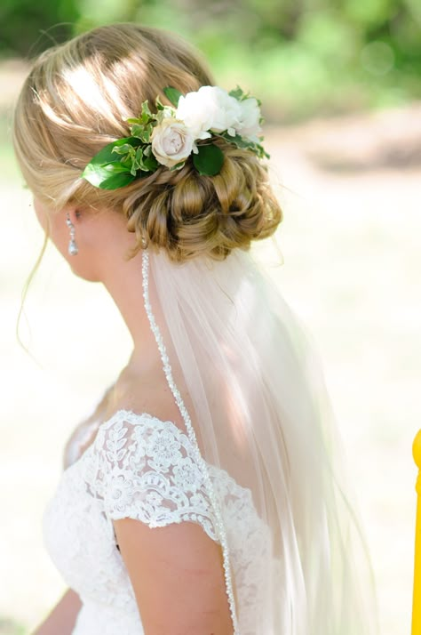 Wedding updo with flowers. Love how my veil went under so that it didn't damage the flowers! Wedding updo with veil underneath. Bridal Updo With Veil, Fake Names, Flower Crown Hairstyle, Romantic Wedding Hair, Wedding Crashers, Wedding Hairstyles With Veil, Best Wedding Hairstyles, Trendy Wedding Hairstyles, Wedding Hair Flowers