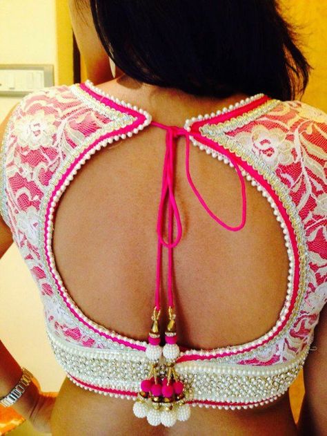 Hot pink lining with white lace blouse for saree with big round winder back neck design Lace Blouse Design, Choli Blouse, Blouse Back Neck Designs, Sari Blouse Designs, Blouse Designs Indian, Saree Blouse Patterns, Back Neck Designs, Choli Designs, Salwar Kamiz