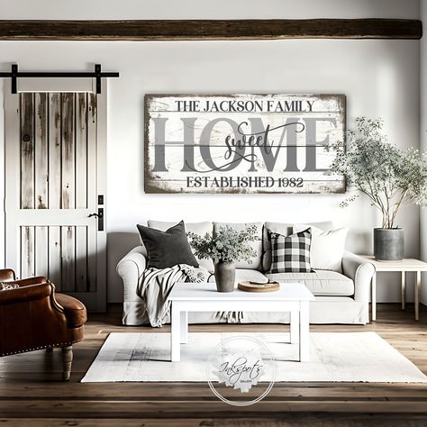 "Large Home Sweet Home sign for your  modern farmhouse living room, kitchen, bedroom or entryway featuring last name and year etablished on a distressed background. Choose from either a light, wood look background or rustic black background. The artwork also makes a beautiful and thoughtful wedding gift, anniversary gift or housewarming gift. And the beauty of canvas ...  the colors are very vibrant, it's lightweight and super easy to hang, so you won't need to hassle with finding the right lags and hardware to hang a heavy wood sign. Signs are made-to-order on genuine artist canvas that has a patented, warp-resistant construction, so there won't be any sagging. Each canvas is 1.25\" deep and comes with a sealed finish backing and pre-installed hanging hardware.  READY TO ORDER  Ordering i