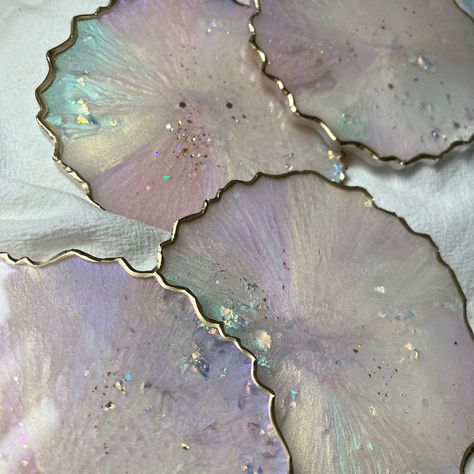 "Set of 4 coasters, these are a pastel colors and opal/ glitter flakes with gold edges These are approximately 4\" in diameter. Let me know if you would like this style in another coaster shape or another color as a custom order! I can also make a matching tray in this style." Pastel Resin Coasters, Rainbow Resin Coasters, Opal Resin, Blue Coasters, Random Products, Resin Coaster, Stylish Nails Designs, Nails Today, Glitter Flake