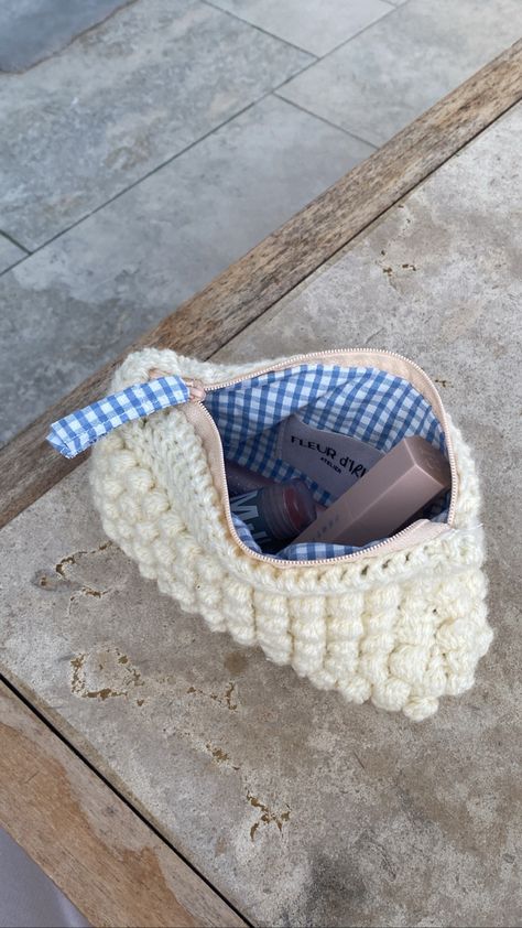 Handmade, toiletry bag using yarn sewed nicely. Crocheted, sewed toiletry bag. 
Aesthetic cosmetic bag Knit Makeup Bag, Crochet Toiletry Bag, Makeup Bag Crochet, Crochet Makeup Bag, Bobble Crochet, Mending Clothes, Beginner Crochet Tutorial, Crochet Pouch, Crochet Business