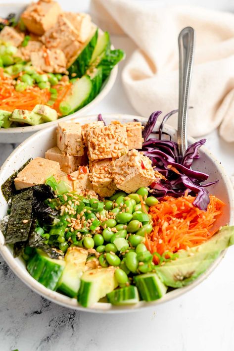 This vegan tofu poke bowl features tofu poke marinated in sesame ginger soy sauce paired with rice, edamame and fresh veggies. Tofu Poke Bowl, Tofu Poke, Vegan Poke, Lime Marinade, Chili Garlic Paste, Poke Bowls, Satay Sauce, Seaweed Snacks, Vegan Tofu