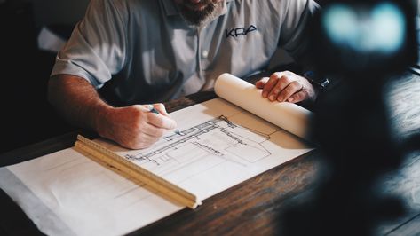 I like the framing of this shot - I think shooting people looking at plans/models is going to be awkward, so just shooting hands probably reduces the awkwardness. Simple Floor Plans, Building A Cabin, Steven Holl, Peter Zumthor, Barndominium Floor Plans, Detailed Plans, Floor Framing, Construction Management, Construction Cost