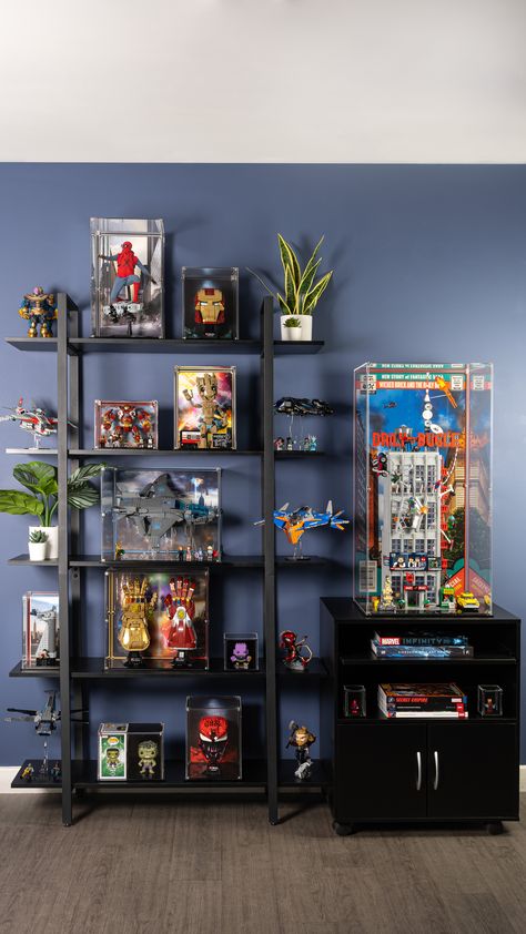 Large collectible display featuring numerous Marvel collectibles Marvel Figures Display, Lego Marvel Display, Lego Shelf Display Shelving Ideas, Collectibles Display Ideas, Lego Room Display, Lego Shelf Ideas, Lego Showcase, Display Shelves For Collectables, Gamer Shelf