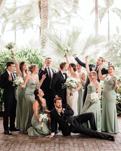 A vibrant, stylish bridal party bringing effortless energy and elegance—celebrating the newlyweds with a perfect mix of fun and sophistication. Loved the girls sage green dresses. Soooo complimentary to this venue and overall classic wedding theme. 🤍 Champagne Sage Green Black Wedding, What Color Suit Goes With Green Dress, Wedding Party Colors Green, Wedding Green Colour Schemes, Wedding Ideas Aesthetic Green, Black Suit Green Bridesmaid, Sage Wedding Party Attire, Bridal Party Photos Sage Green, Sage Green And Black Tux Wedding