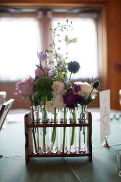 Science Wedding Centerpieces, Flower In Test Tube, Chemist Graduation Party, Test Tubes With Flowers, Flowers In Test Tubes, Test Tube Flower Arrangements, Propagation Centerpiece Wedding, Science Centerpieces, Chemistry Flowers