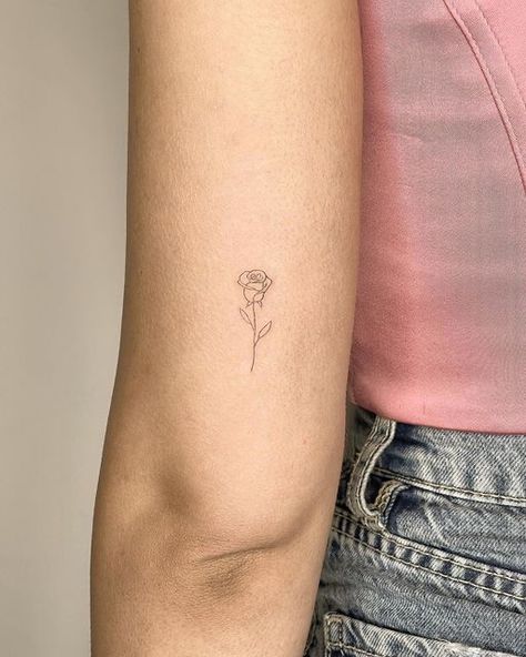 Small Rose Tattoo For Women, Rose Minimalist Tattoo, Small Rose Tattoos For Women, Tattoo Ideas Female Rose, Rose Tattoo Fine Line, Rose Line Tattoo, Rose Fine Line Tattoo, Small Rose Wrist Tattoo, Dainty Rose Tattoo