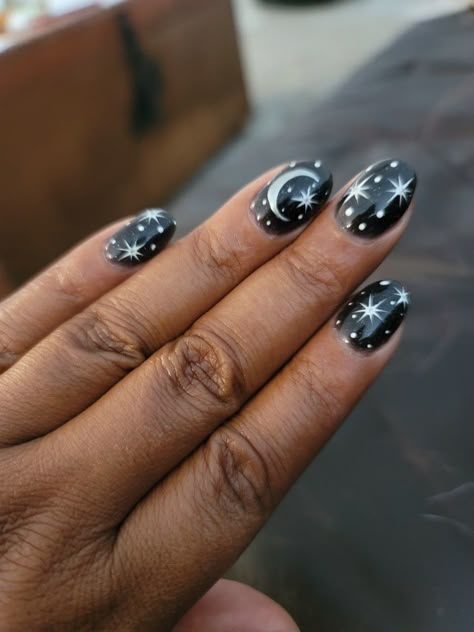 Black Nails With Moon And Stars, Celestial Pedicure, Moon Stars Nail Art, Star Fingernails, Moon And Star Nail Art, Nail Designs Moon And Stars, Midnight Rain Nails, Black Nails With Silver Stars, Star And Moon Nail Designs