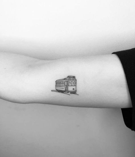 Lisbon tram. Train Car Tattoo, Tiny Train Tattoo, Istanbul Tattoo Ideas, Train Tattoos For Women, Lisbon Tattoo, Portuguese Tattoo, Train Tattoo, Patchwork Tattoos, Inner Arm Tattoos