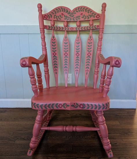 Bold pink rocking chair with tons of hand painted details. ❤️ #handpaintedrockingchair #paintedrockingchair #rockingchair #handpainted #handpaintedfurniture #colorfulhome #colorfulinterior #interiordesign #folkart #boho #bohostyle #bohodecor #botanicalart #botanical #uniqueinteriors #fusionmineralpaint #handpainteddecor #smithfieldva #virginiaartist #upcyclefurniture #upcycle Folk Art Chair, Christmas Chairs, Pink Rocking Chair, Painted Rocking Chairs, Christmas Chair, Painted Chair, Hand Painted Decor, Art Chair, Fusion Mineral Paint