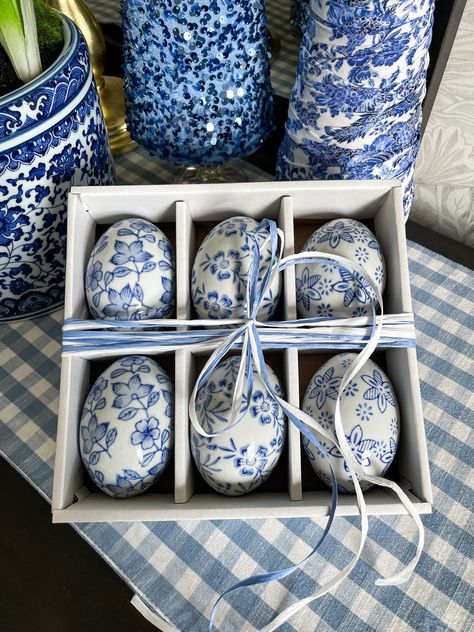 Beautifully hand painted porcelain eggs are sure to be noticed by everyone. Featuring a chinoiserie chic blue and white design, each of these eggs can be placed in a silver-plated bowl, or for maximum exposure add them to a glass vase as the centerpiece of the table. Set of 6 Dimensions Egg- 3.25" H x 2.25"W Box-6.75"L x 6.25"W Assorted 3 designs Porcelain Hand painted Gift boxed Blue Willow Decor, Willow Decor, Blue And White Dinnerware, Safe House, Blue And White Design, Pysanky Eggs, Liberty Blue, Hand Painted Gifts, Porcelain Eggs