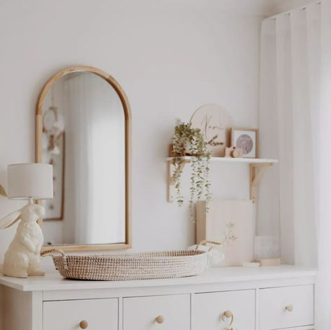 We're in love with this beautifully styled nursery + playroom! 😍

Soft tones + Sheer Curtains create a serene + calming atmosphere, perfect for little ones to relax or play in. Arched Mirror Nursery, Mirror In Baby Nursery, Wall Shelves Above Dresser, Arch Mirror Nursery, Nursery Mirror And Shelves, Nursery Gold Mirror, Shelving In Nursery, Nursery Dresser With Mirror, Nursery Corner In Bedroom