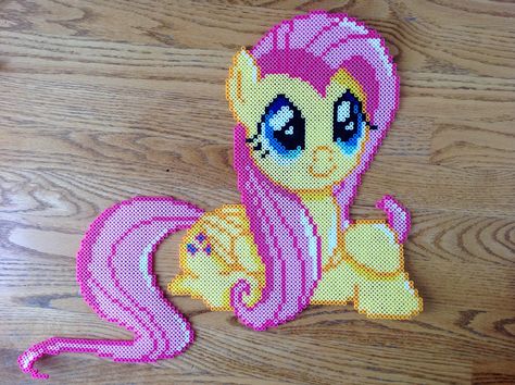 {Perler} Fluttershy Being Cute by OddishPonyGirl on DeviantArt My Little Pony Perler Beads, Cute Perler, Mlp Fluttershy, 3d Perler Bead, Fuse Bead Patterns, Pony Bead Patterns, Perler Bead Templates, Bead Sprite, Melting Beads