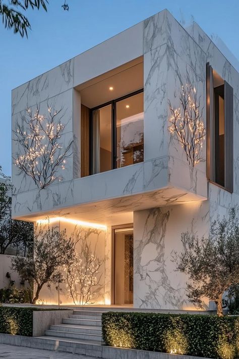 Dazzling modern house with marble facade and glowing branches. Unearth the quirky magic of cool modern houses, where sleek lines meet playful innovation to tickle your architectural fancy. Cool Modern Houses, Marble Facade, Japandi Home Decor, Ultra Modern Homes, Japandi Home, Stone Pathway, Rustic Stone, Glass Facades, Modern Houses