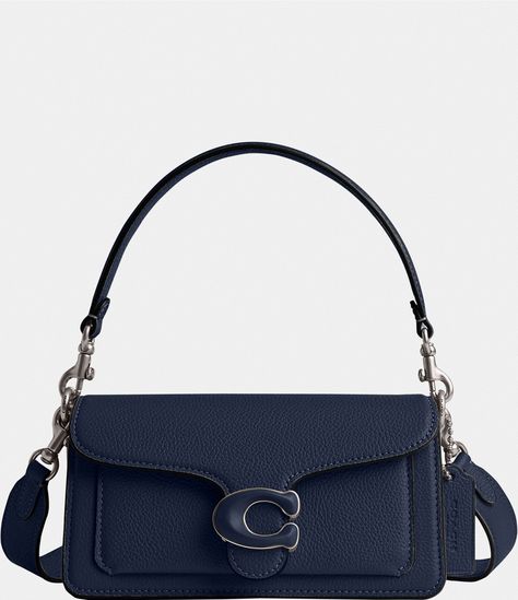 From COACH, the Tabby 20 Shoulder Bag features:Polished pebble leather and refined calf leatherInside zip and multifunction pocketsSnap closure, fabric liningDetachable handle with an approx. 5.5 dropOutside open pocketDetachable strap with an approx. 21.5 drop for shoulder or crossbody wearApprox. 7.75 (L) x 4.25 (H) x 2.75 (W)Imported. Coach Blue Bag, Tabby Coach Bag, Coach Bag Tabby, Blue Designer Bag, Blue Wishlist, 90s Bag, Navy Blue Bag, Navy Purse, Coach Tabby