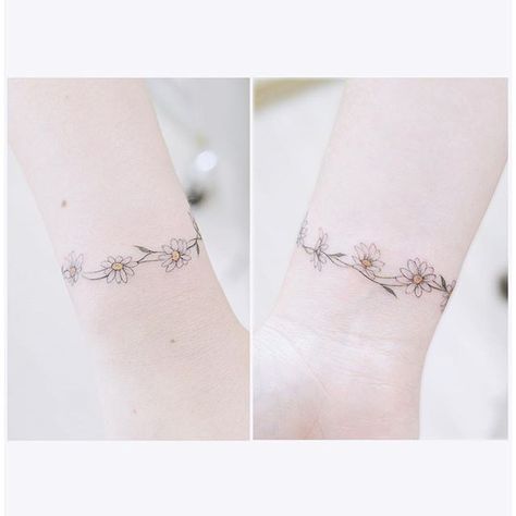 Daisy chain tattoo ... Daisy Chain Tattoo Ankle, Chain Tattoos, Tattoos For Wrist, Daisy Tattoo Meaning, Daisy Chain Tattoo, Mini Instagram, Alas Tattoo, Daisy Tattoo Designs, Daisy Flower Tattoos