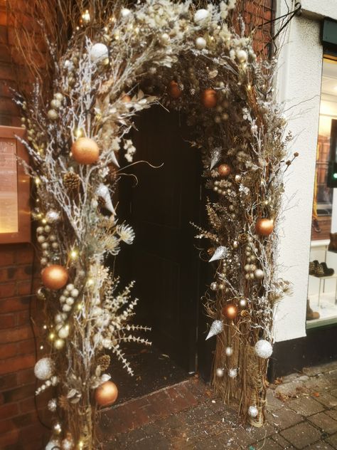 xmas archway created for The Olive Tree Brasserie in Stockton Heath, England Christmas Doorway Arch, Christmas Archway Outdoor, Christmas Archway Decor Indoor, Christmas Arches, Ornament Arch, Christmas Archway, Christmas Tree Arch, Archway Decor, Christmas Arch