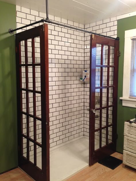 Our 2020 walk in shower remodel using repurposed French doors. Repurposed Shower Doors, French Door To Bathroom, French Door Shower Doors, Repurpose French Doors, Repurposed French Doors, Bathroom With Door To Outside, Walk In Shower No Door No Glass Ideas, Diy Shower Door Ideas, French Shower Doors