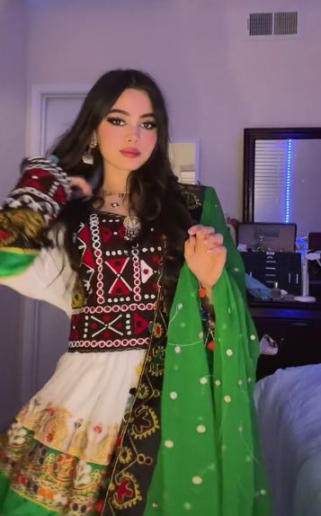 Afghan girl in afghan dress Gand Afghani, Afghani Culture, Cultural Clothes, Breakup Messages, Gown Dress Party Wear, Afghanistan Culture, Afghan Culture, Henry Danger Jace Norman, Afghan Dress