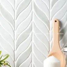 Leaf Tile Backsplash Kitchen, Leaf Tile Backsplash, Leaf Backsplash, Bathtub Tile Surround, Luxury Hotel Bathroom, Bathtub Tile, Glazed Tiles, Handmade Mosaic, Hotel Bathroom