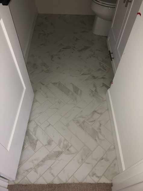 Arizona Tile, Themar 3x12, Calcutta in a herringbone pattern Calcutta Herringbone Bathroom, Gold Tile Bathroom, Gold Tiles Bathroom, Herringbone Bathroom, Calcutta Gold, Arizona Tile, Gold Tile, Herringbone Floor, Flooring Inspiration