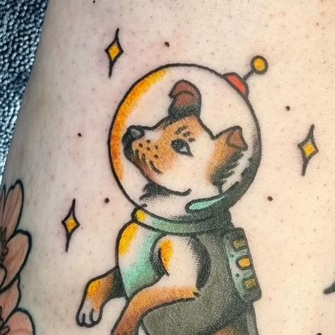 ♡ Glasgow Tattoo Artist ♡ Caitlin ♡ on Instagram: "A little Liaka space puppy for Leanne! Thanks for letting me tattoo this sweet baby 💕🐶 @luckyinlovetattoos  * * #tattoo #tattooideas #tattoos #inked #inkaddict #traditionaltattoo #americantraditional #blackandgreytattoo #colourtattoo #art #illustration #illustrator #tattooartist #topclasstraditional #oldlines #traditionalartist #skinarttraditional #oldworkers #colourful #glasgowtattooartist #glasgowtattoo #dog #dogtattoo" Laika Space Dog Tattoo, Space Dog Tattoo, Dog Traditional Tattoo, Cartoon Dog Tattoo, Laika Tattoo, Angel Moodboard, Lab Tattoo, Me Tattoo, Space Dog