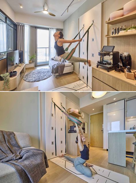 A small apartment includes safe and secured yoga wall with rope hooks and belts allows yoga to be practiced at home Yoga Rope Wall, Small Yoga Studio Design, Small Yoga Studio, Movable Table, Yoga Rope, Wall Yoga, White Wall Paint, Rope Wall, Glass Balcony