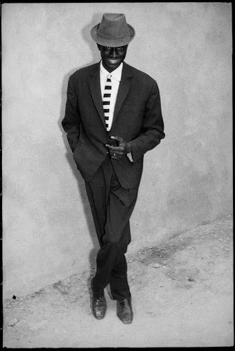 Karim Keïta - The Gentleman - Malick Sidibé — Google Arts & Culture Malik Sidibe, Malick Sidibe, Malick Sidibé, Contemporary African Art, The Gentleman, Simple Pictures, Small Village, Soft Sculpture, Art Google