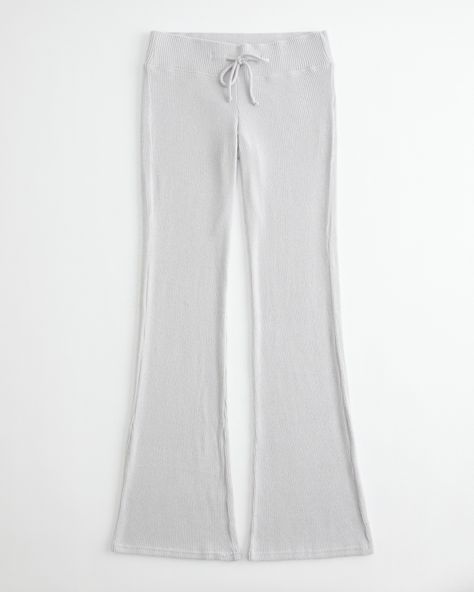 Women's Cozy Ribbed Flare Pants | Women's Bottoms | HollisterCo.com Cozy Flare Pants, Ribbed Lounging Bottoms, Cozy Beige Lounging Bottoms, Cozy White Ribbed Bottoms, Sporty Flare Lounge Pants, White Cozy Bottoms With Ribbed Waistband, Gray Flare Leggings, Ribbed Flare Pants, Teenage Clothing