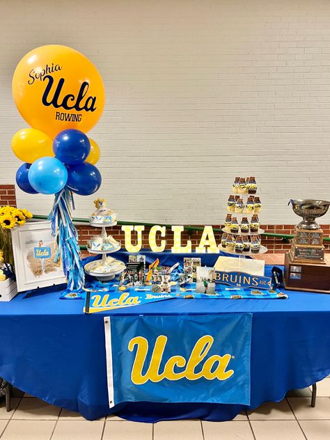 Ucla Party Decorations, Ucla Party Ideas, College Signing Table Ideas, Senior Table Ideas Cheer, Signing Party Ideas College, Signing Tables For College, Signing Day Table Ideas College, College Table Display, Football Signing Day Table Ideas