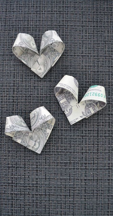 The money heart is an amazing dollar origami and an unusual gift for Valentine's day! We need 2 dollar bills. Without using glue or tape. The idea and design by Anastasia Prokuda. I wish you a pleasant viewing! Subscribe to my channel! Money Hearts Dollar Bills, Folding Dollar Bills Into Flowers, Valentine Money Gift Ideas, Origami Dollar Bills, How To Fold Dollar Bills Into Flowers, Money Hearts, Folding Money Into Flowers, Money Origami Diy, Heart Dollar Origami