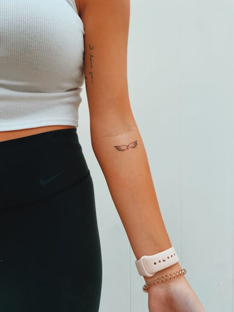 Tiny Tattoo Forearm, Angel Wings On Forearm Tattoo, Simplistic Angel Wings Tattoo, Angel Wings Tattoo Inner Arm, Angel Wing Dainty Tattoo, Angel Tattoo Danty, Cute Small Forearm Tattoos For Women, Cute Tattoo Words, Minimalistic Memorial Tattoos