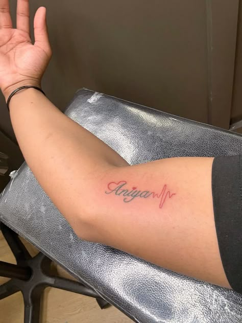 Name Tattoo “Aniya” with a heart and a lifeline Fine Print Name Tattoo, Kayden Tattoo Name, Heart Tattoo With Name Inside, Tyler Name Tattoo, Aiden Name Tattoo, Alicia Name Tattoo, Rose Name Tattoos For Women, Abcd Tattoo, Kid Names Tattoo Ideas