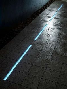 Add outdoor rated strip light channels to sidewalks to combine safety and style. #lightingdesign Urban Lighting Design, Cheap Outdoor Patio Ideas, Wall Lights Diy, Indoor Pools, Outdoor Lantern Lighting, Led Tape Lighting, Led Light Design, Urban Lighting, Modern Outdoor Lighting