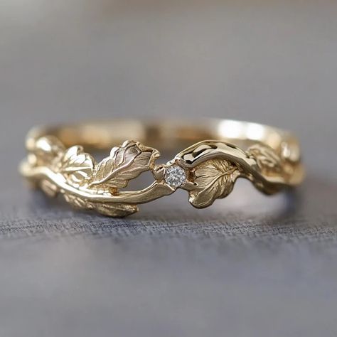 Easygoing elegance meets nature’s charm. 🍃✨ Crafted in solid gold with a little sparkle at its heart. 🌿💛 💍 #diamondengagementring #diamondring #NatureInspired #GoldBand #engagementring #weddingband #weddingring Gender Neutral Rings, Leafy Wedding Band, Wedding Bands For Women Unique, Gold And Silver Wedding Band, Organic Wedding Ring, Nature Rings, Wedding Bands Women, Wedding Ring Minimalist, Irish Wedding Rings