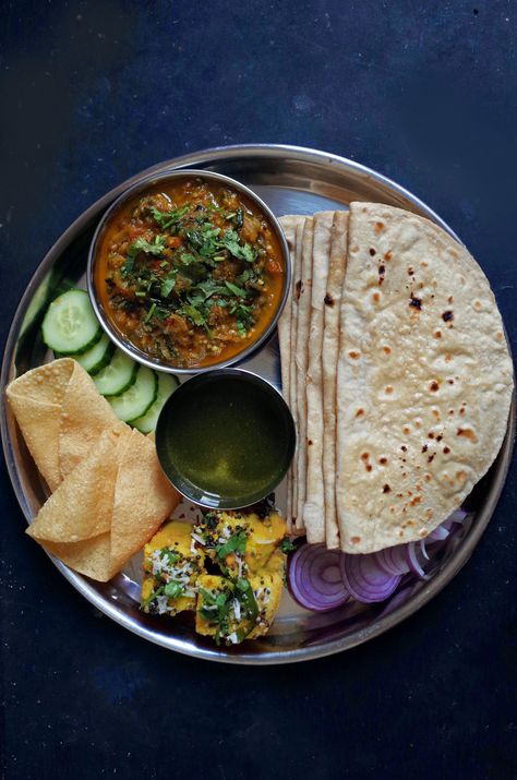 Chapatis Indian, Lentil Crisps, Indian Food Thali, Homemade Indian Food, Indian Flatbreads, Food Thali, Curry With Spinach, Aubergine Curry, Roasted Aubergine