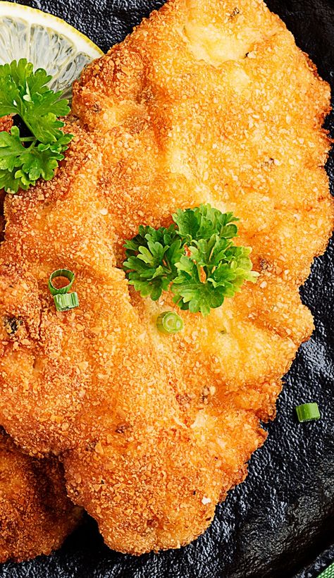 Air fryer crispy Walliser schnitzel recipe. Walliser schnitzel, a traditional Austrian dish of breaded pork cutlets served in cream sauce with dumplings, is the perfect dinner to prepare in an air fryer. #airfryer #pork #schnitzel #dinner #recipes #crispy via @slavabondarev Air Fryer Schnitzel Pork, Air Fryer Pork Schnitzel, Pork Snitzel, Veal Cutlet Recipes, Breaded Pork Cutlets, Pork Schnitzel Recipe, Pork Medallion Recipes, Veal Schnitzel, Beef And Pork Meatballs