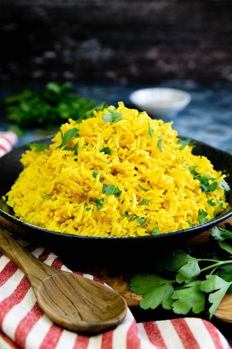 Learn to make this vibrant golden yellow turmeric rice. It is a fragrant, tempting one pot dish that’s perfect with curries and casseroles. Add some colour to your table with this delicious golden rice recipe. It’s so easy to make and ready in less than 30 minutes with about 30 seconds hands on time! | how to make turmeric rice| easy rice recipe| turmeric recipes| #rice #sidedish Instant Pot Turmeric Chicken And Rice, Tumeric Rice Recipe, Turmeric Rice Recipe, Recipes Using Turmeric, Tumeric Rice, Minute Rice Recipes, Cumin Recipes, Golo Recipes, Healthy Rice Recipes