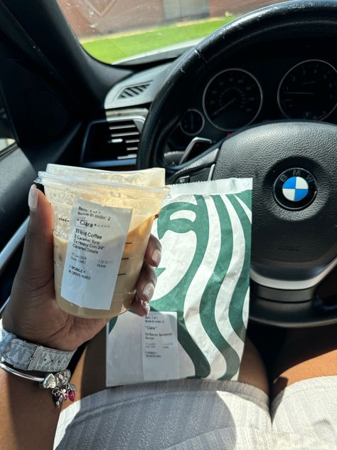 A Starbucks iced coffee and sandwich in the car, perfect for a morning pick-me-up Starbucks Cappuccino, Starbucks Caramel Macchiato, Starbucks Caramel, Coffee Aesthetics, Coffee On The Go, Classic Sandwich, Caramel Macchiato, Starbucks Drinks, Cappuccino