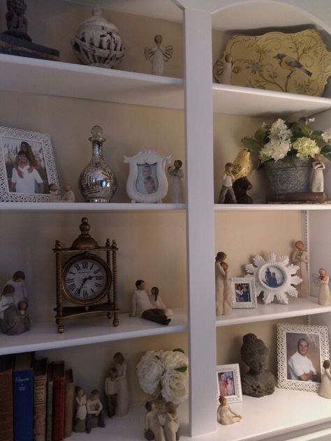 Willow tree angels collection on a bookcase Willow Tree Collection Display, Display Willow Tree Figurines, Willow Tree Angel Display Ideas, Willow Tree Decor Ideas, Willow Tree Figurines Display Ideas, Willow Tree Display Ideas, Willow Tree Display, Shelf Staging, Picture Walls