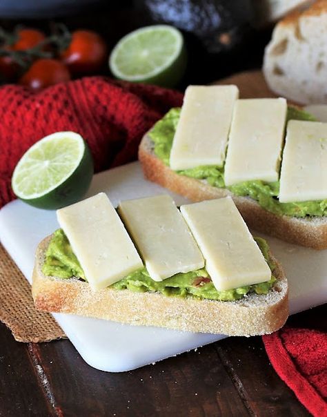 Layers of Guacamole and Cheddar Cheese on a Slice of Sourdough Bread Image Sourdough Bread Grilled Cheese, Grilled Cheese With Avocado, Tomato Avocado Grilled Cheese, Avocado Tomato Grilled Cheese, Guacamole Grilled Cheese, How To Make Guacamole, Easy Guacamole, Homemade Guacamole, Grilled Cheese Recipes